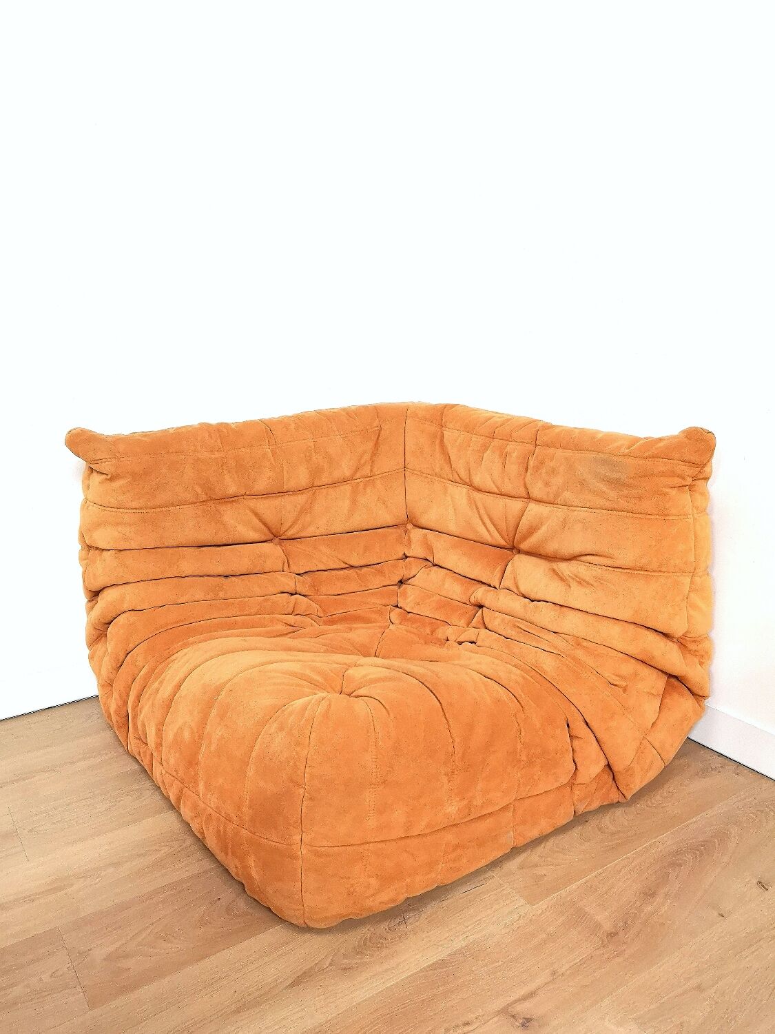 Togo corner armchair in "peach skin" by Michel Ducaroy for Ligne Roset