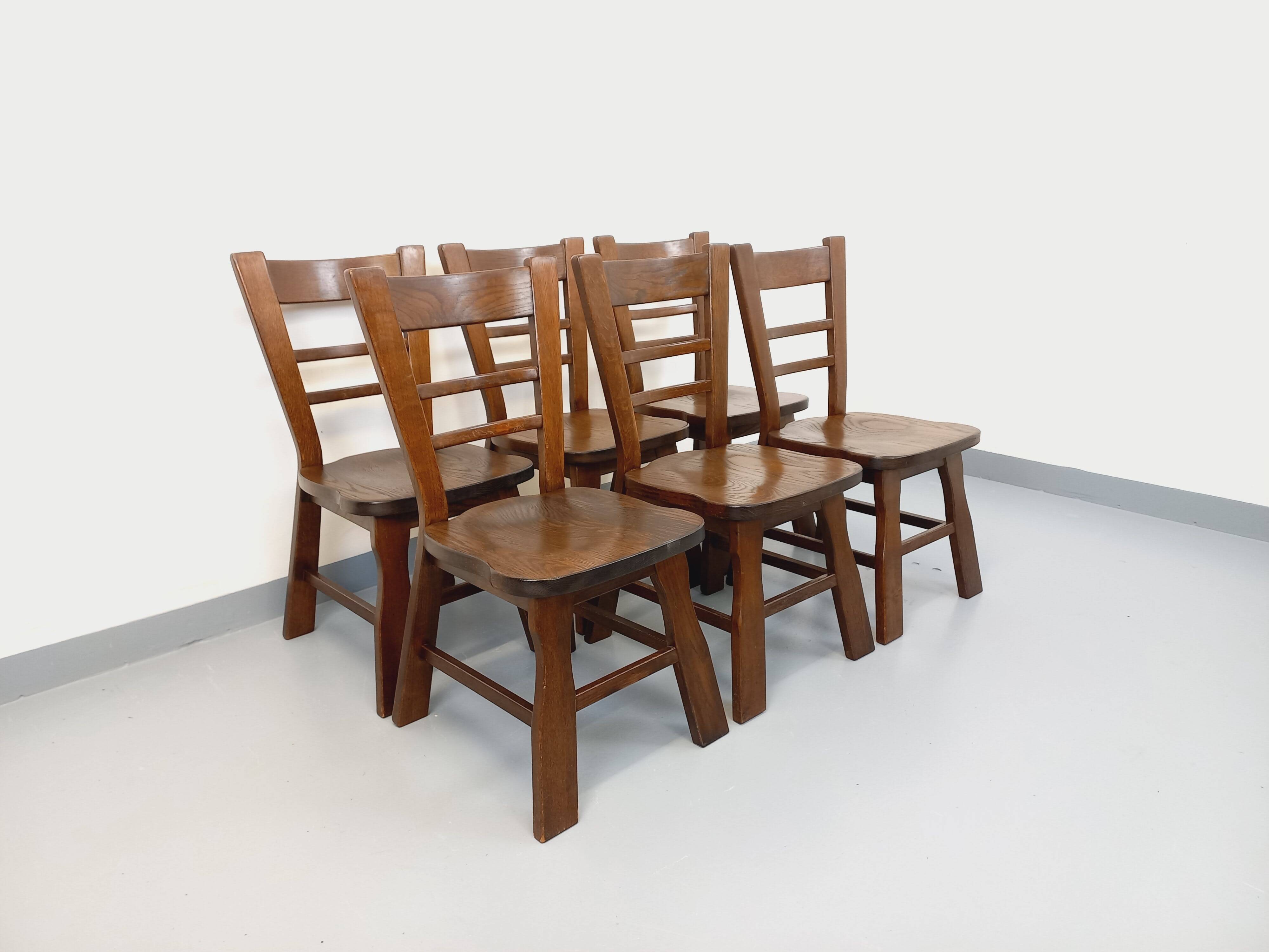 Set of 6 vintage brutalist oak chairs from the 1950s.