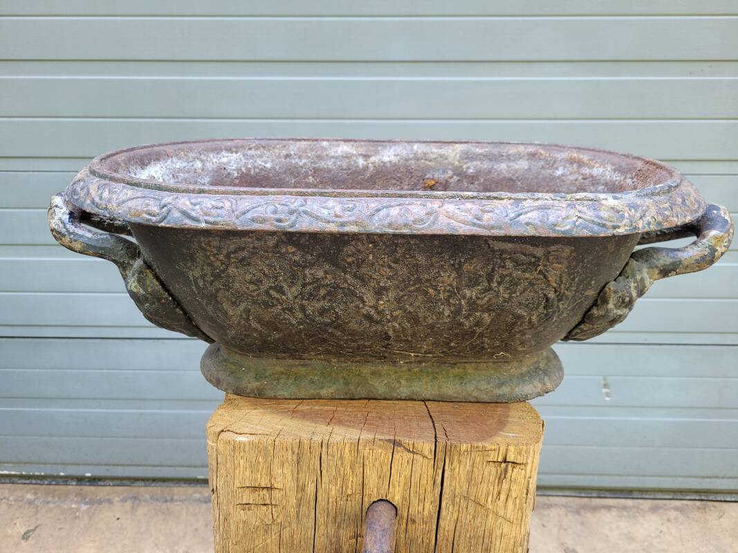 Antique cast iron flower planter jardiniere