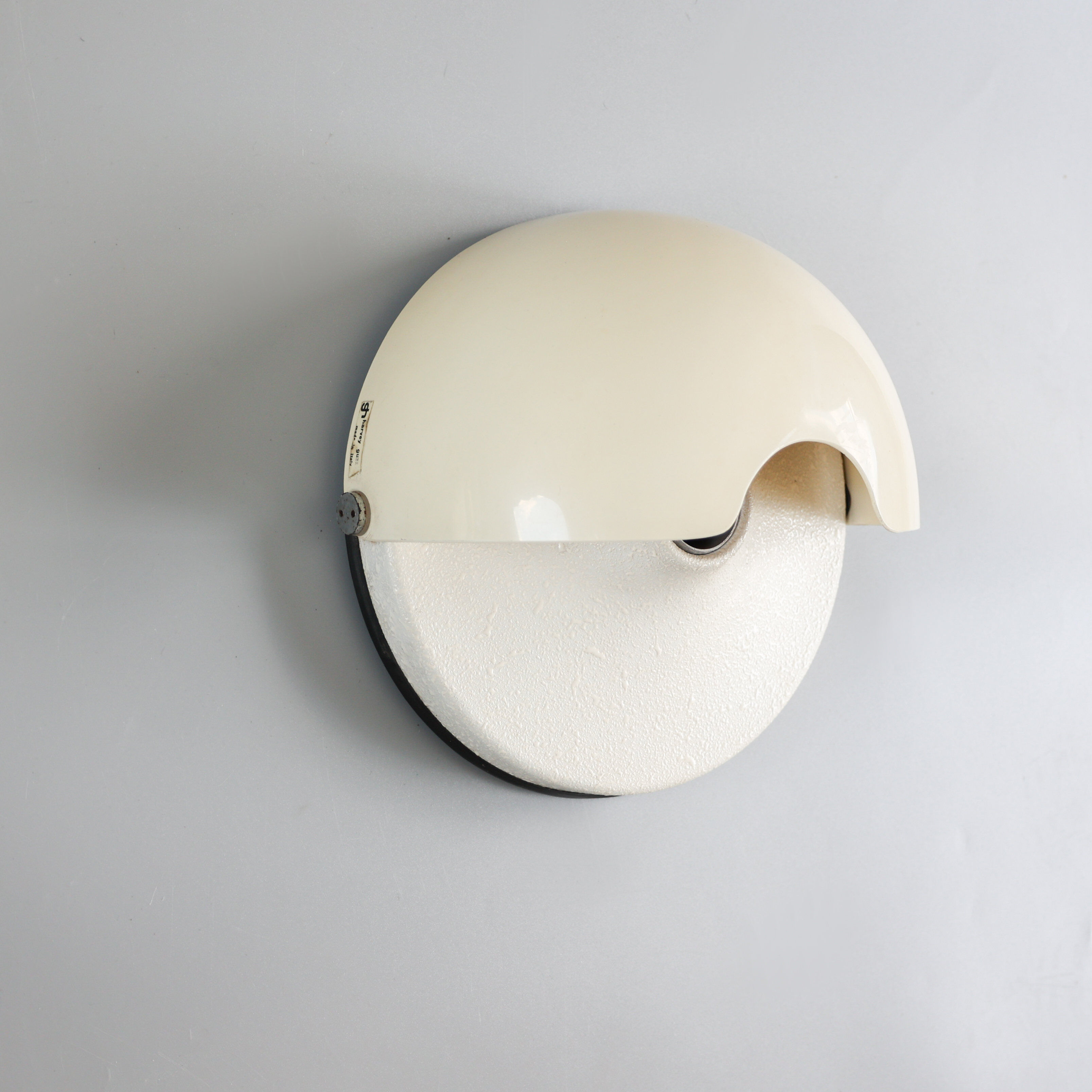 Vintage Harvey Guzzini 'Mezzanotte' sconce, 1970s.