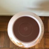 Pale pink and golden earthenware vase