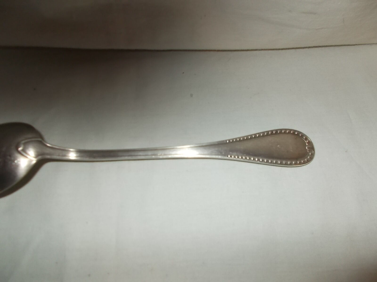 Silver metal serving spoon