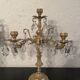 Duo of bronze chandeliers with tassels