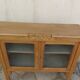 Art Deco sideboard in wood, with 2 glass doors.