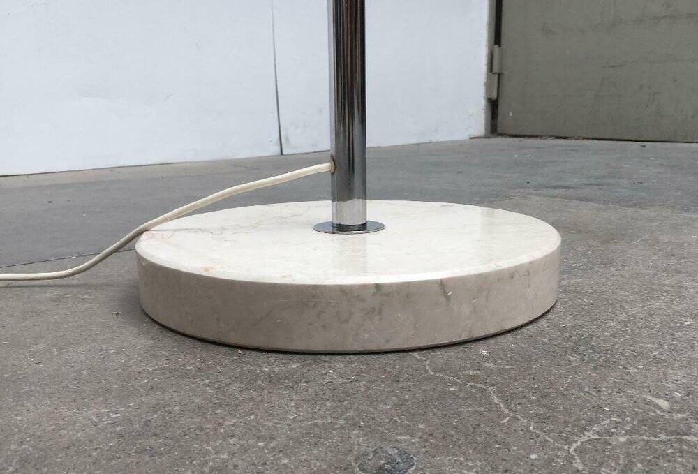 Italian space-style floor lamp from the 1960s with a stone base.