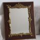 Old wooden and stucco mirror