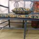 Pretty painted and upholstered bench in green and blue.