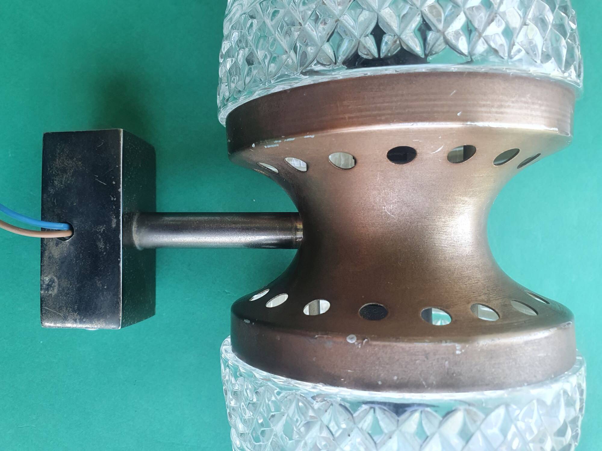 Vintage brass wall sconce with two glass globes