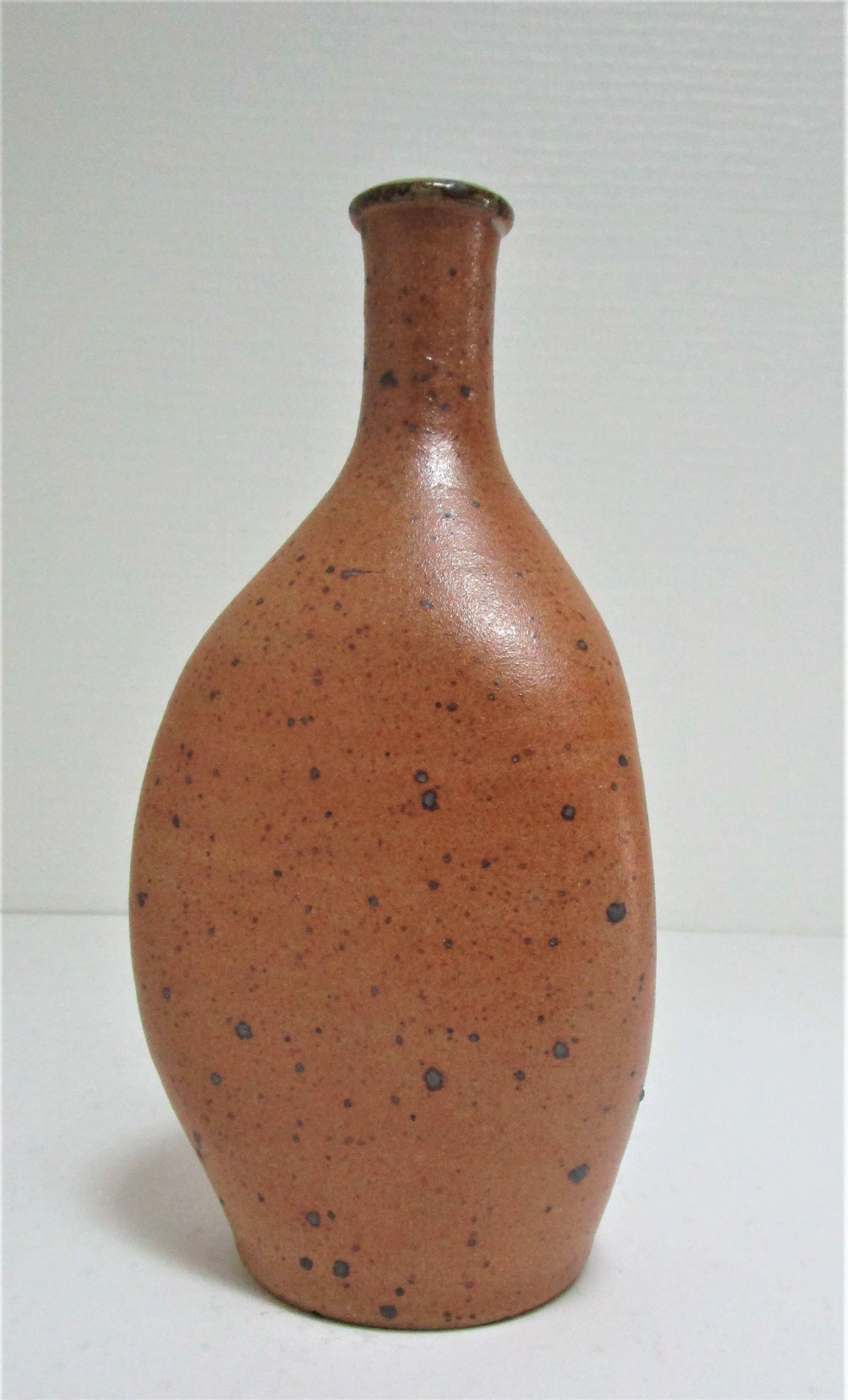 Soliflore vase in pyrite sandstone with three vintage faces