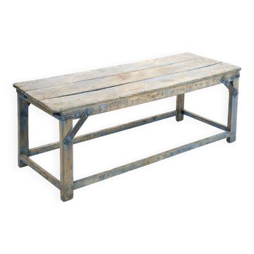 Wooden coffee table and metal reinforcements with blue patina