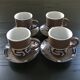 Set of 4 brown stoneware mugs and saucers with blue decor