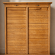 Old oak filing cabinet with curtains, notary furniture style.