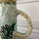 Antique handcrafted ceramic pitcher