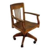 Oak wood office chair with swivel seat and swivel wheels