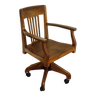 Oak wood office chair with swivel seat and swivel wheels