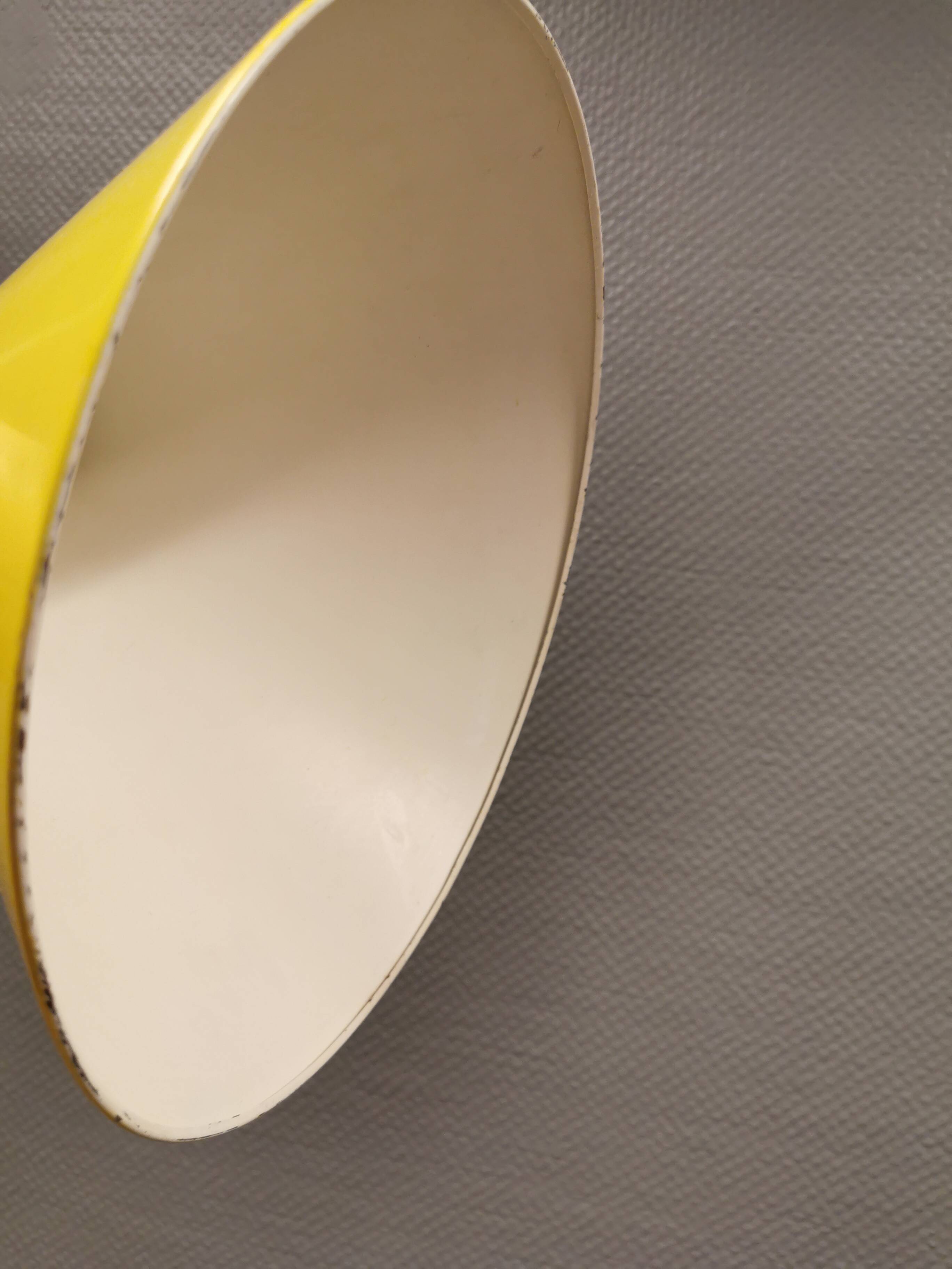 Small cone-shaped lamp in beautiful yellow lacquer finish.