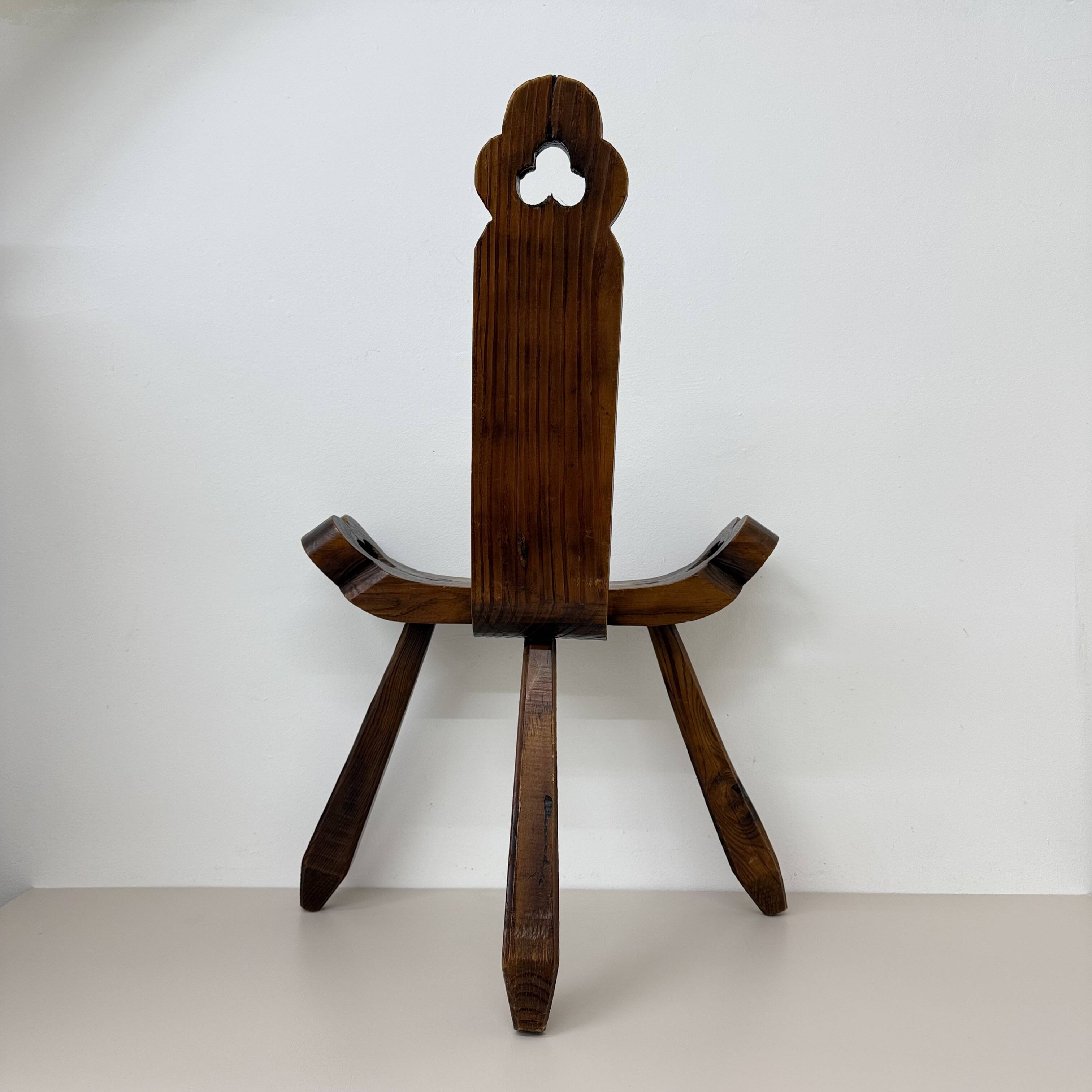 Brutalist hand carved oak Spanish tripod chair , 1970s