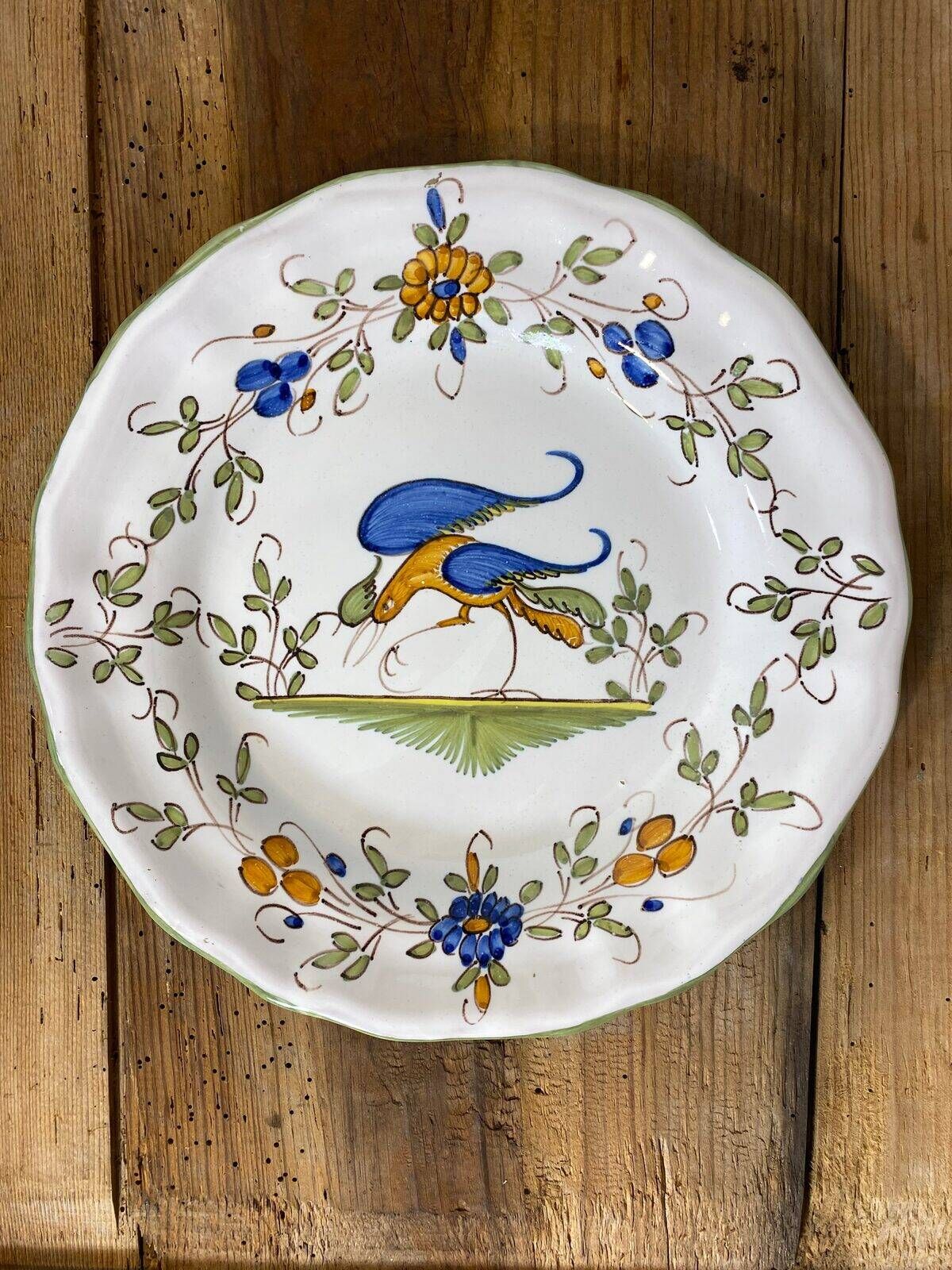 Set of 6 earthenware plates from Moustiers, featuring birds and flowers.