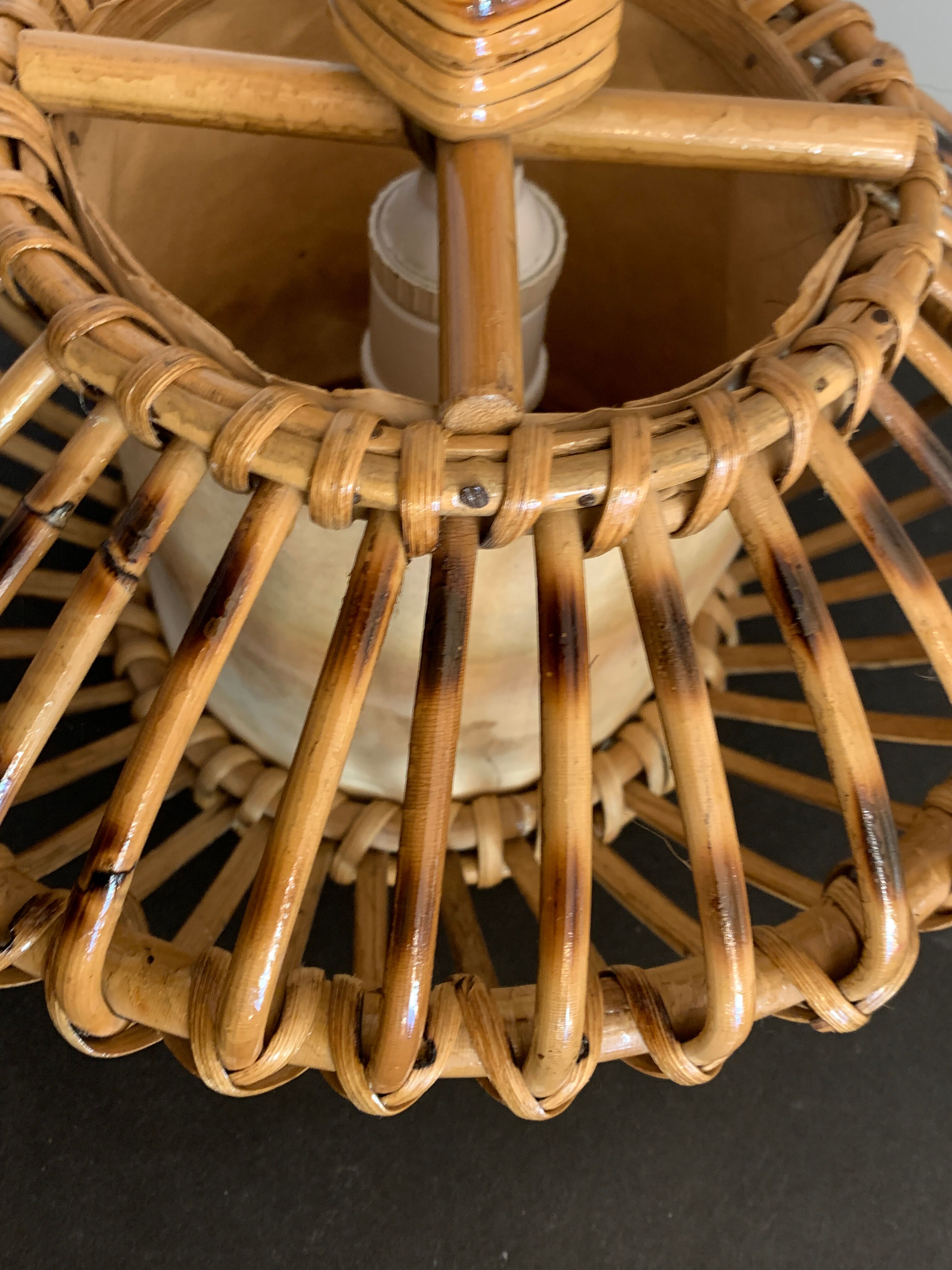 Rattan lamp in the shape of an ellipse Louis Sognot 1950