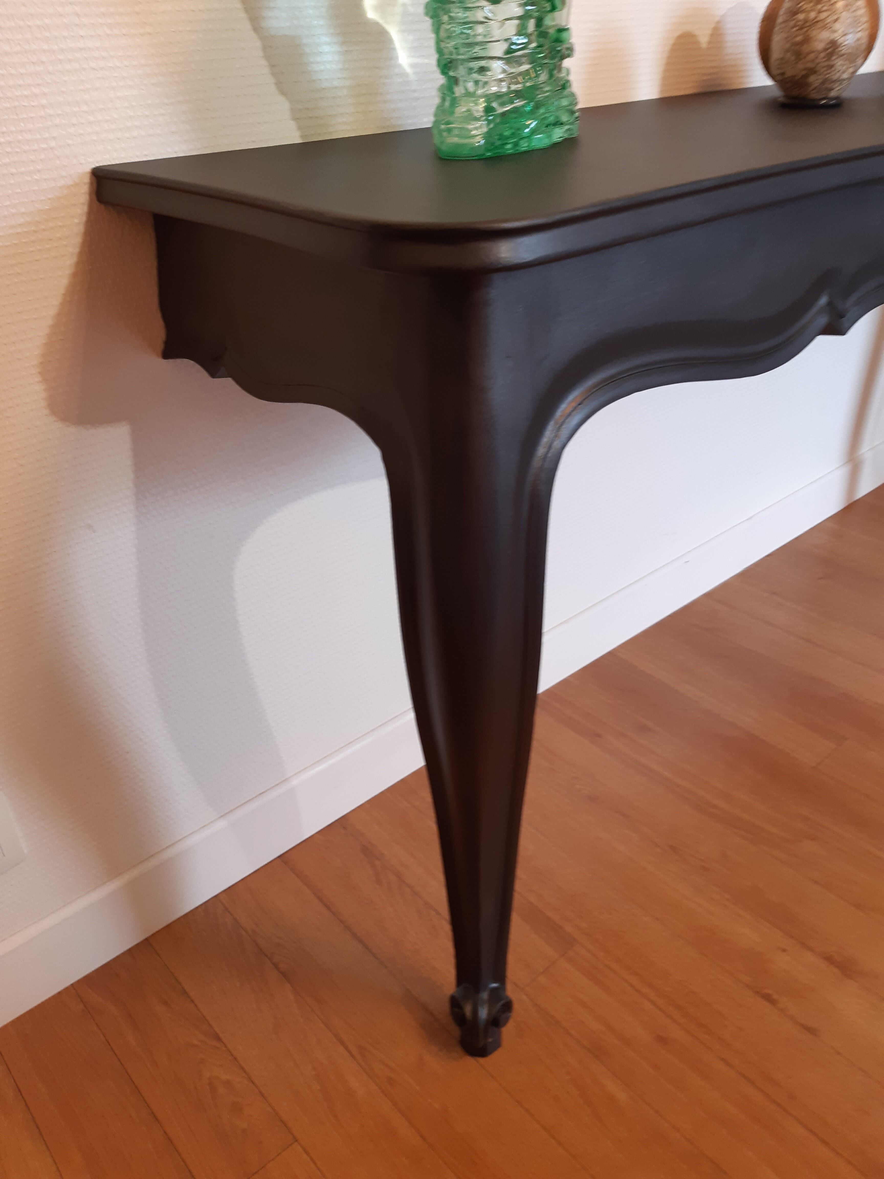 Louis XV-style black wall console