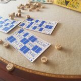Mahogany game table and mahogany veneer, rolling half-moon console or round table.