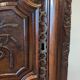 Antique Louis XV bonnetière in carved walnut – Late 18th century