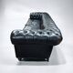 Large and old four-seater leather chesterfield sofa early 20th century l 260 cm