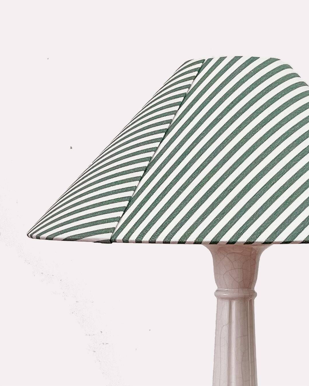 Earthenware lamp and striped lampshade