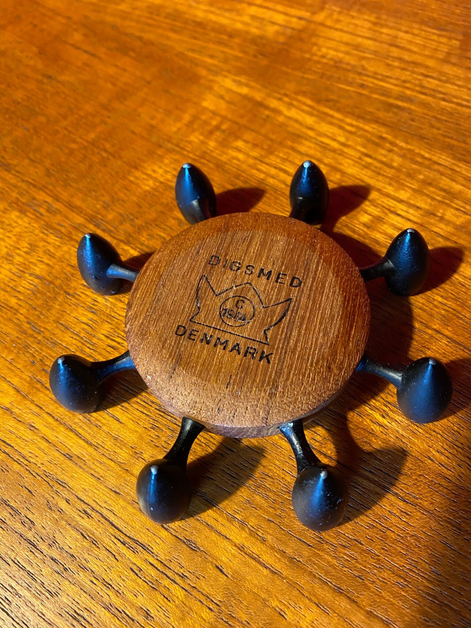 Digsmed teak and metal candle holder with 8 burners