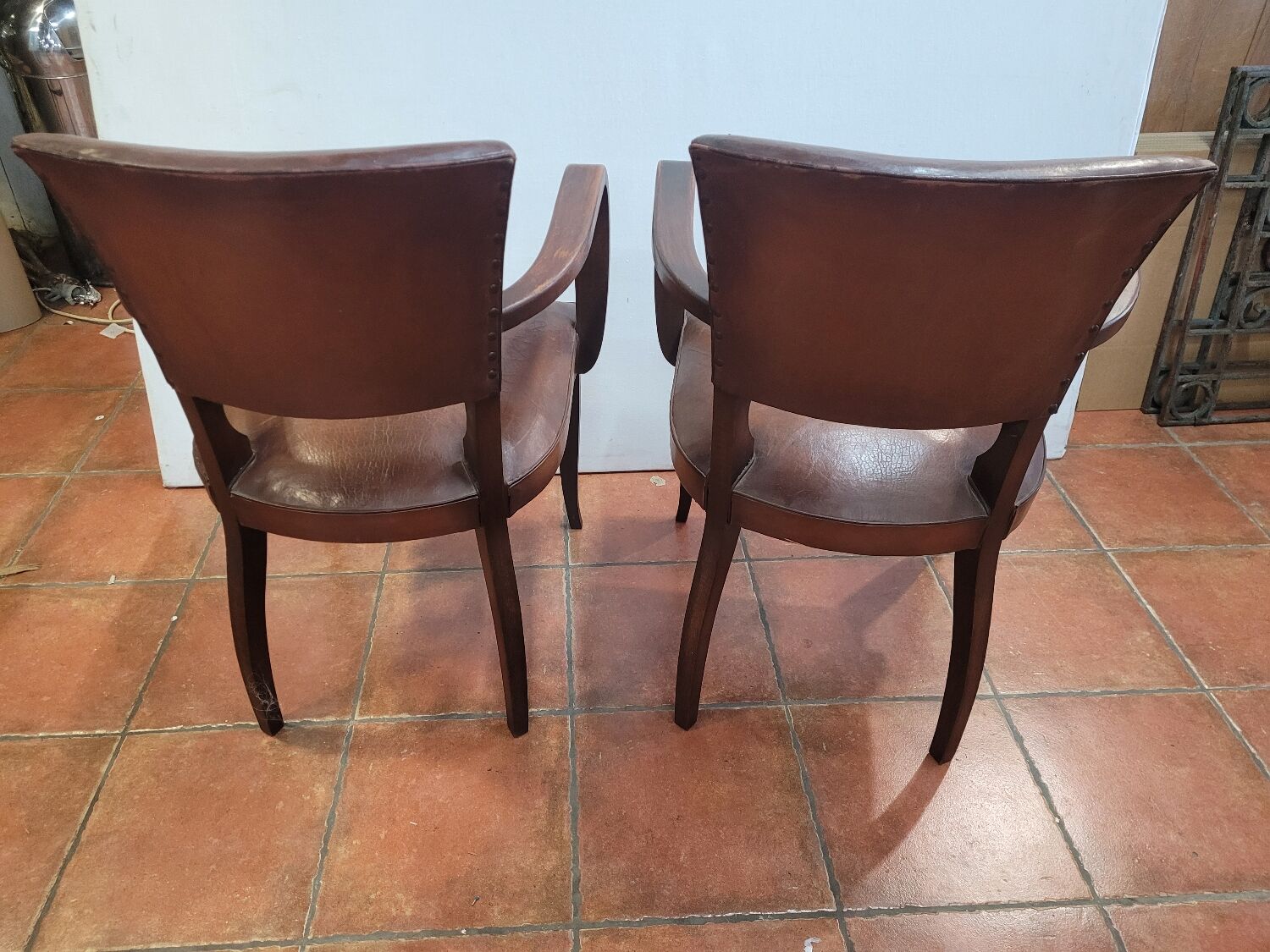 Pair of antique leather bridge armchairs