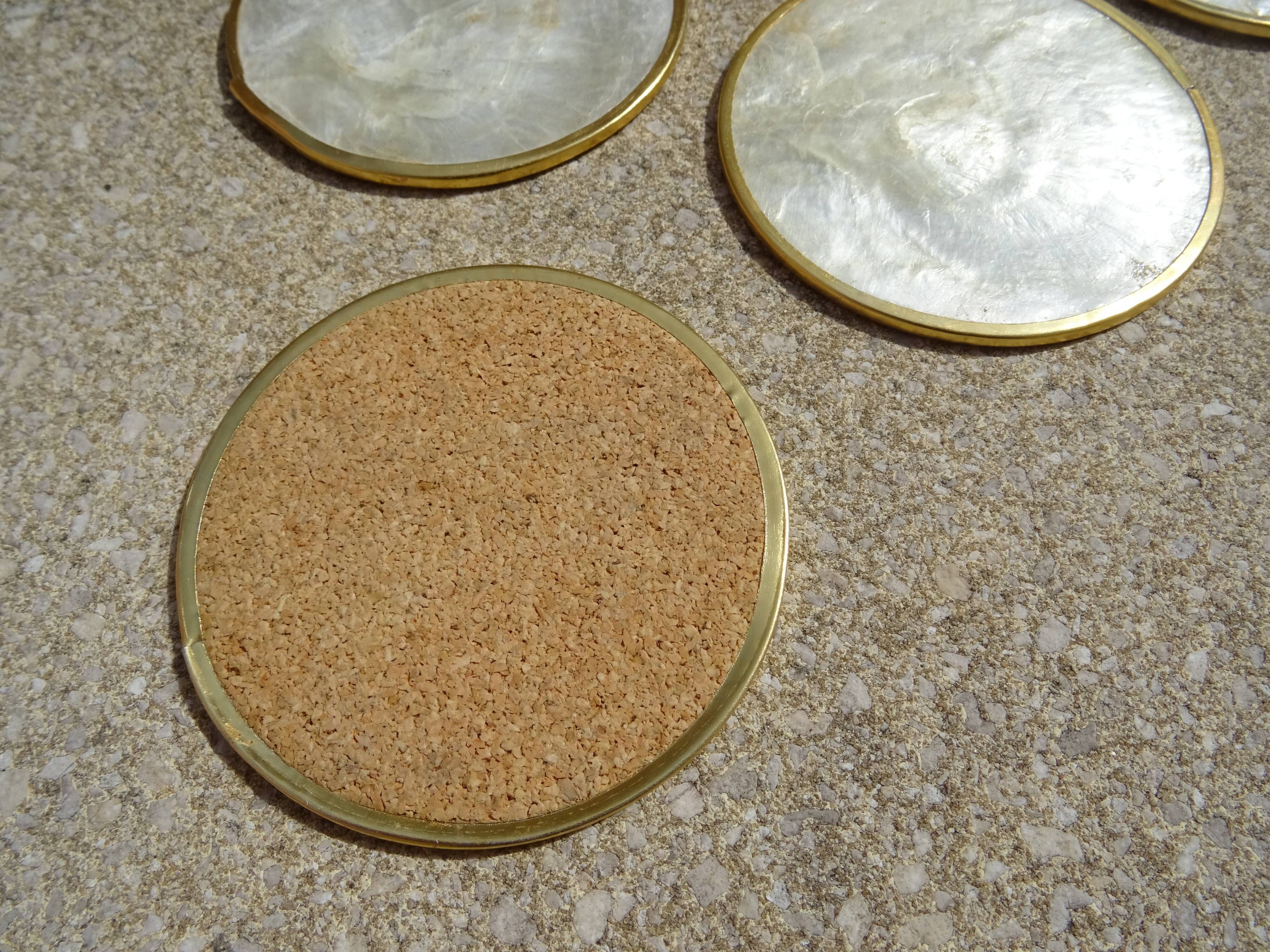Series of 12 vintage mother-of-pearl coasters