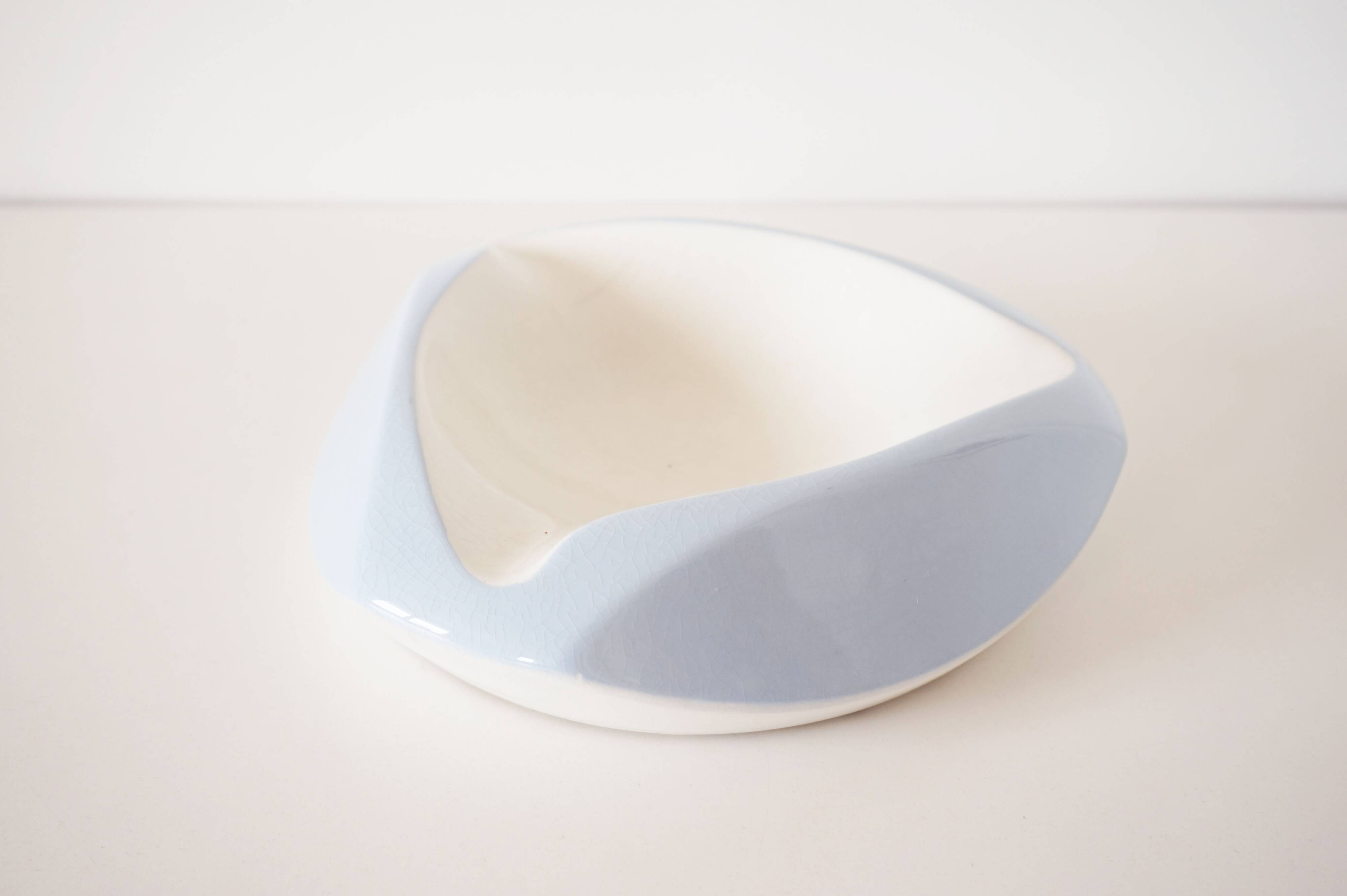 Large white and sky blue ceramic catchall from the 1950s.