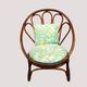 Fauteuil corbeille vintage en rotin à dossier soleil – Style Riviera, année