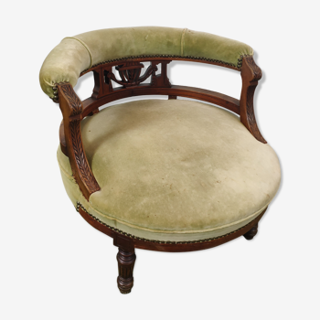 Old green velvet empire chair