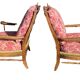 pair of rustic wood and fabric armchairs