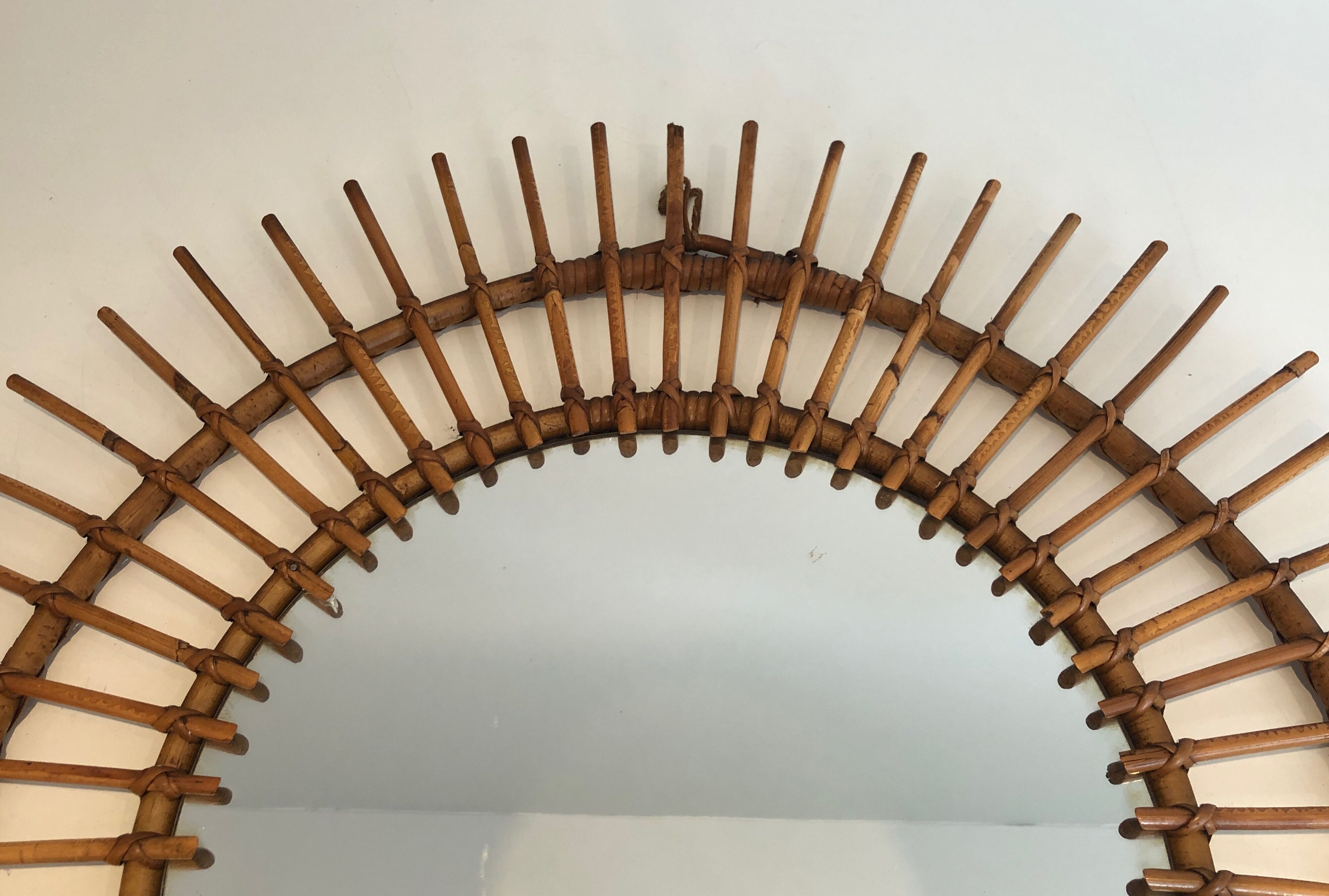 Small Rattan Mirror. French work. Around 1970