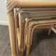 Trio of vintage pull-out tables in rattan and smoked glass 70s