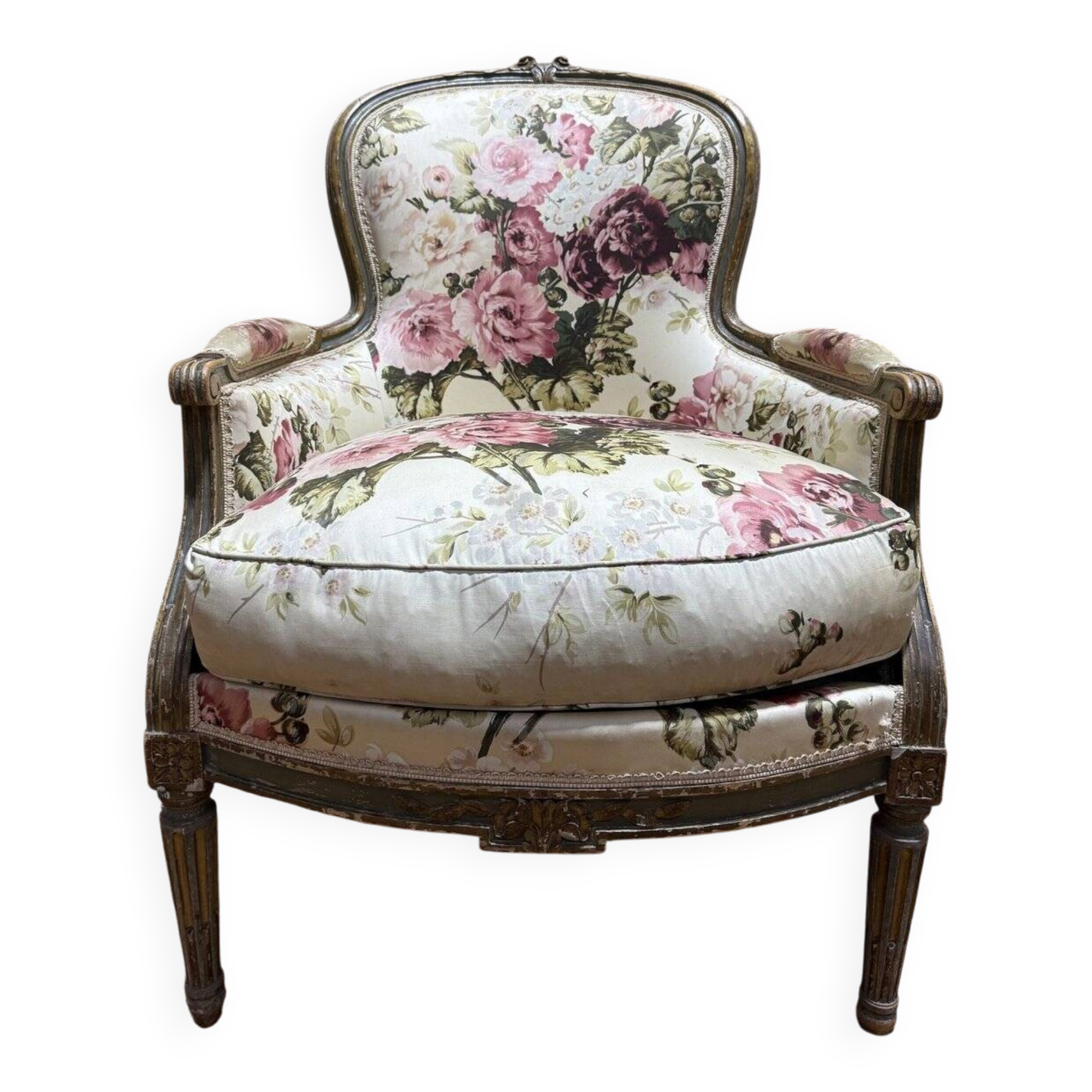 Reupholstered bergère with floral fabric in Louis XVI style.