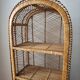 Rattan shelf on legs circa 1960
