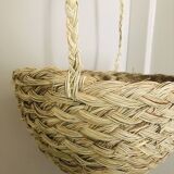 Hanging woven wicker planter
