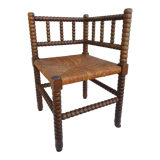 Fauteuil de coin en bois tourné façon chapelet
