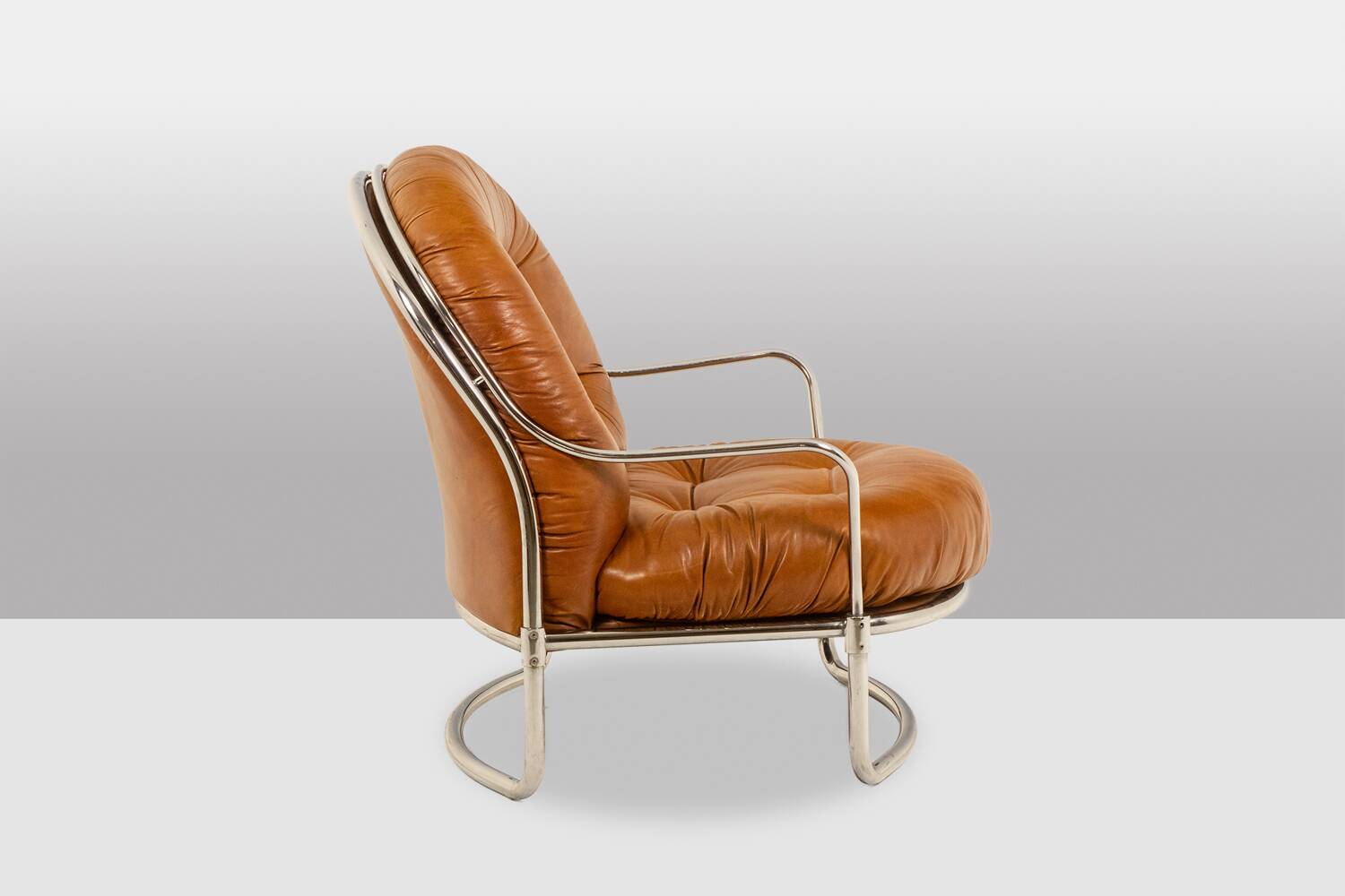 Carlo Di Carli. Leather and metal armchair. 1970s.