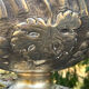 Large silver plated champagne cooler bowl on pedestal with grape