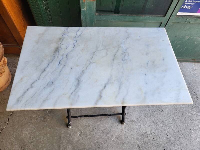 Table bistrot en marbre avec pied en fonte
