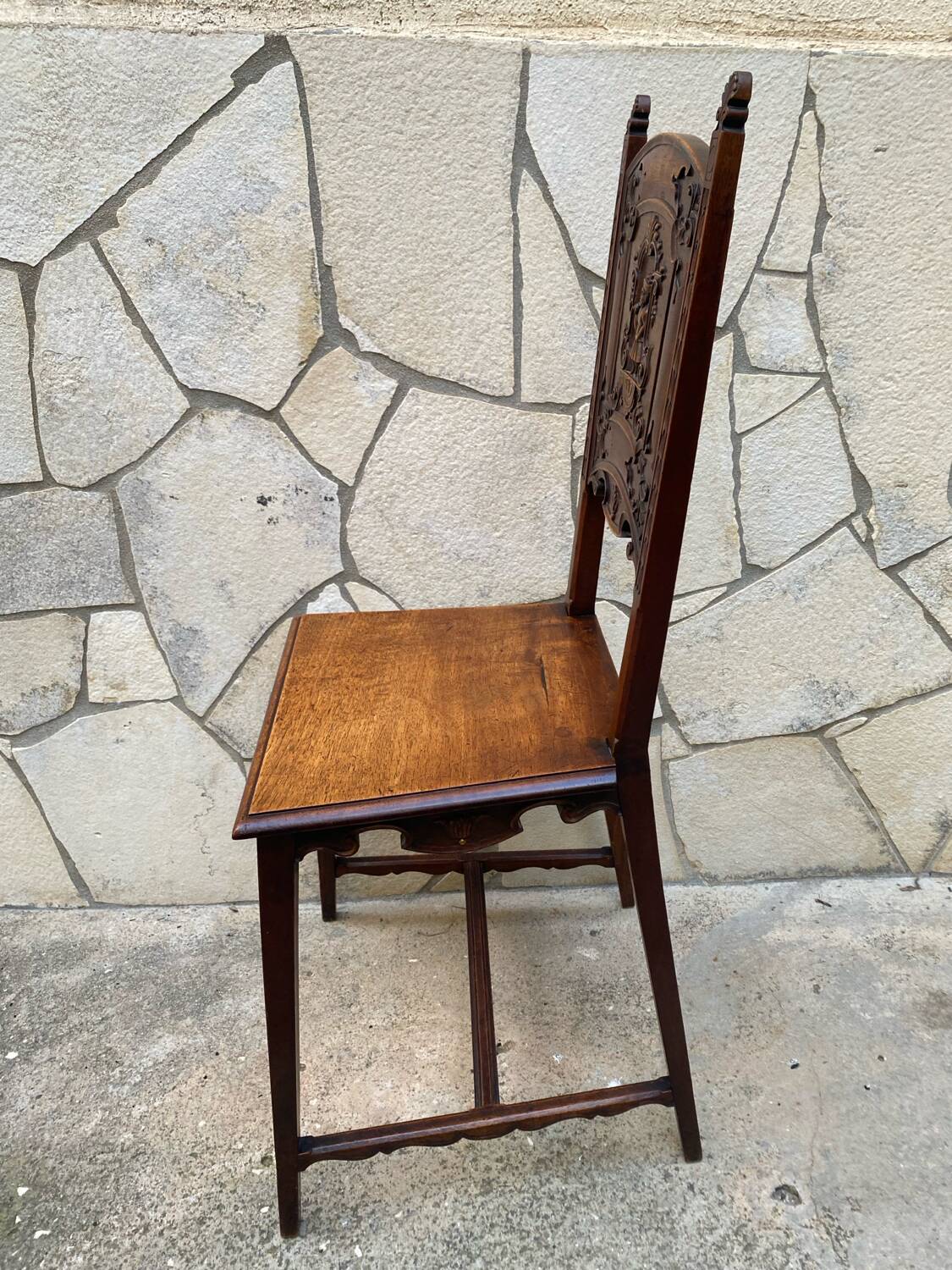 Carved walnut lounge chair