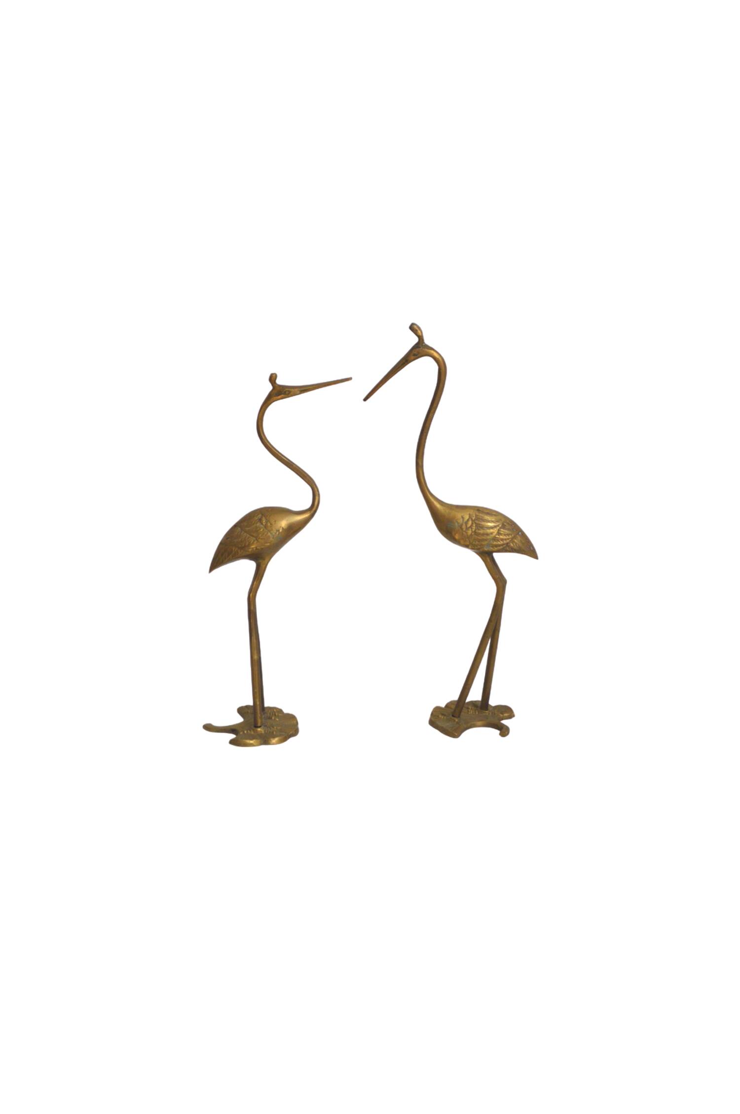 Couple of brass birds