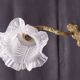 Sconce in golden bronze
