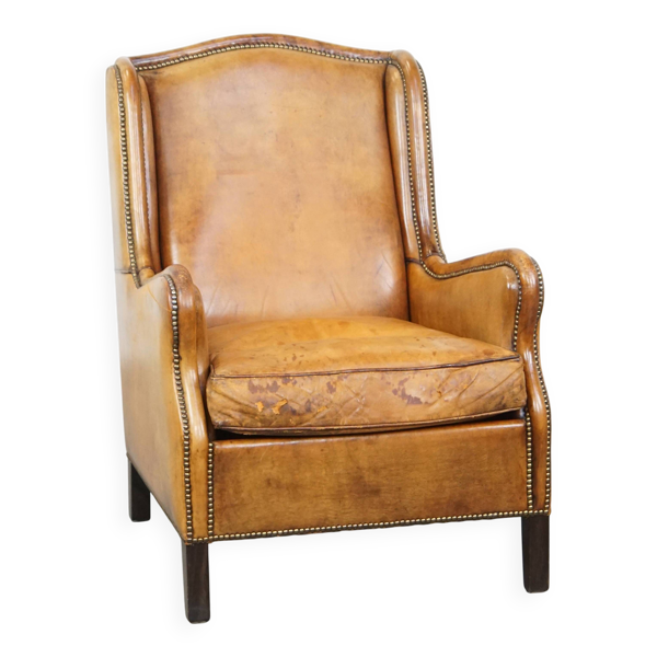 Fauteuil vintage en cuir de mouton couleur cognac avec dossier haut — Beyit