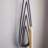 Wrought iron candlestick applied