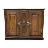 Icebox from the early 20th century in oak with a marble top.